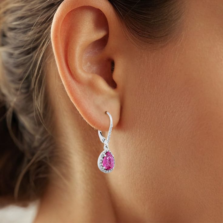 Experience elegance with these Natural Pink Sapphire earrings totaling 2.72 carats. The Pear-shaped gemstones, with measurements of 8.10 x 5.92 x 3.53 mm and 8.17 x 6.09 x 3.41 mm, feature a Brilliant/Step cut, enhancing their brilliance. Their Pink hue adds a touch of sophistication to the ensemble.
With very eye-clean clarity, these Pink Sapphires reveal minimal inclusions, ensuring a flawless appearance. Having undergone a heating treatment, a common industry practice, enhances their color a Pink Sapphire Earrings, Anniversary Gift For Wife, Step Cut, Anniversary Gifts For Wife, Wedding Anniversary Gift, Sapphire Earrings, Gift For Wife, Precious Jewelry, Simple Earrings