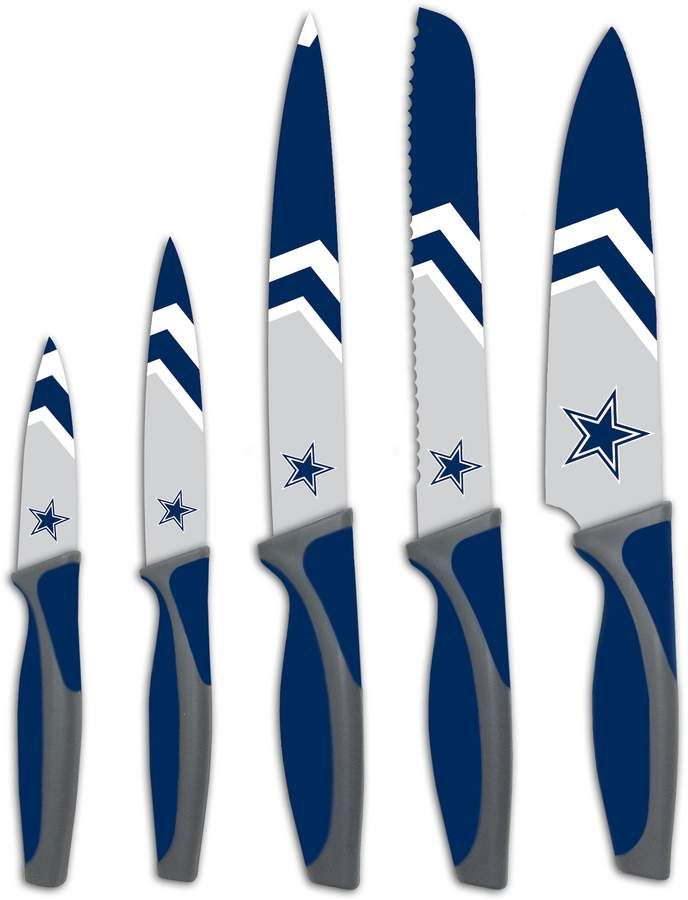 six blue and white knives with stars on them