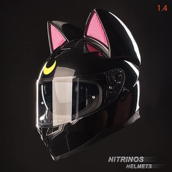 the helmet is designed to look like a cat's head with pink ears and yellow eyes