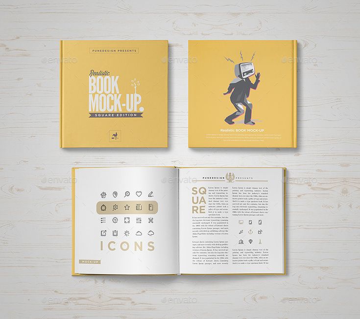 an open book mock up on a wooden table with text and icons in the pages