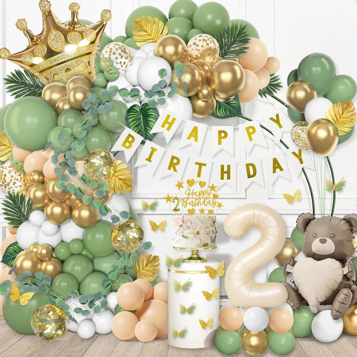 a birthday backdrop with balloons and decorations