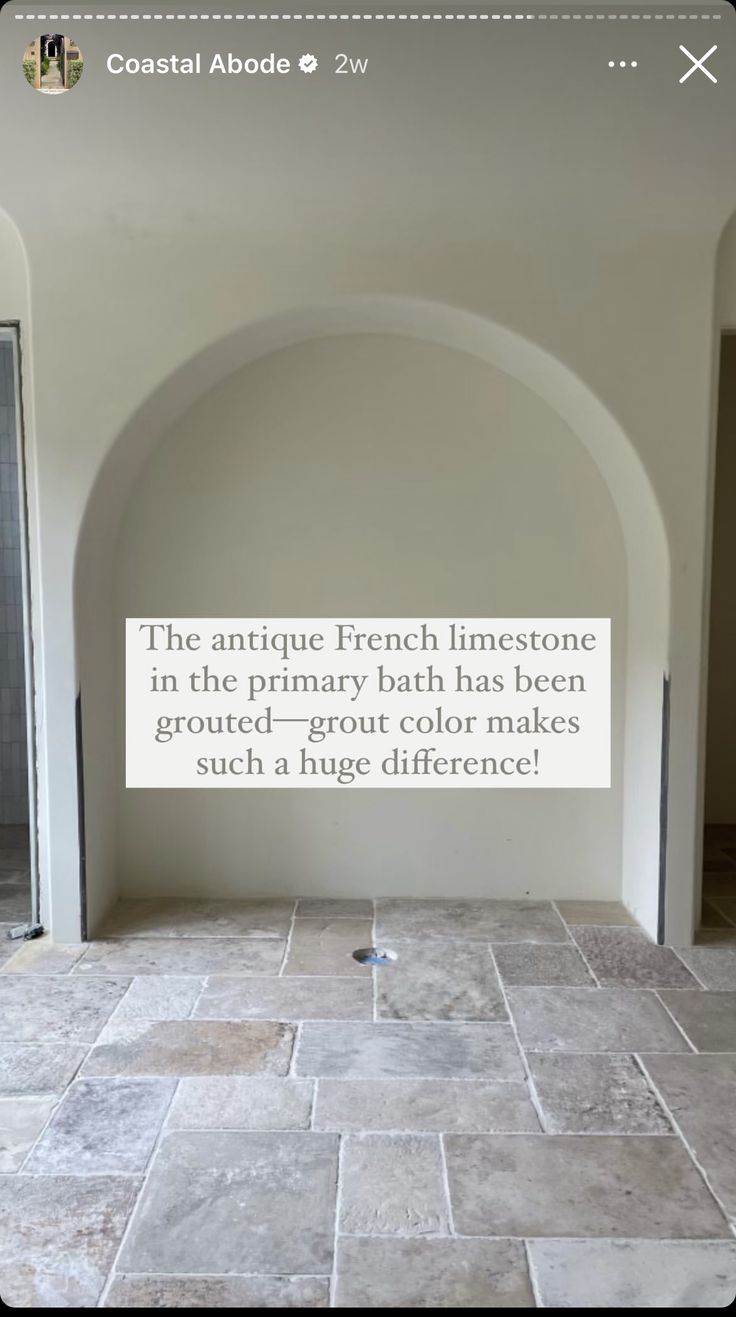 an empty room with a quote on the wall next to it that reads, the antique french interiore in the primary bath has been grouted