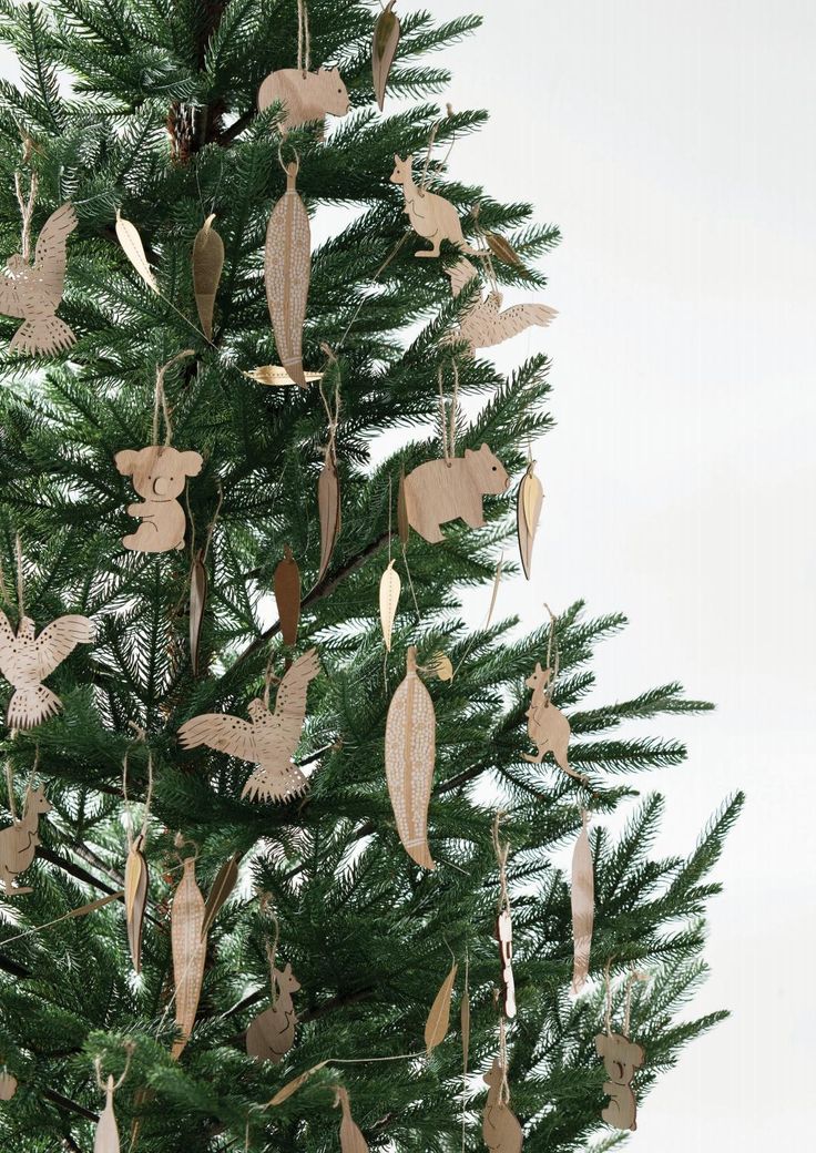 a christmas tree with ornaments hanging from it