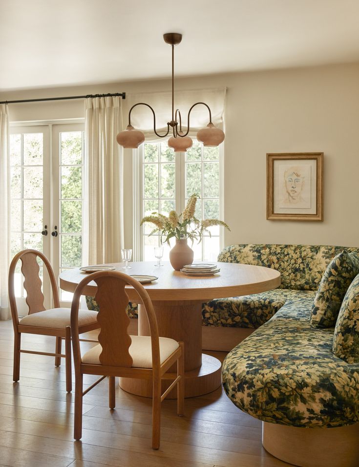 a dining room table with chairs around it