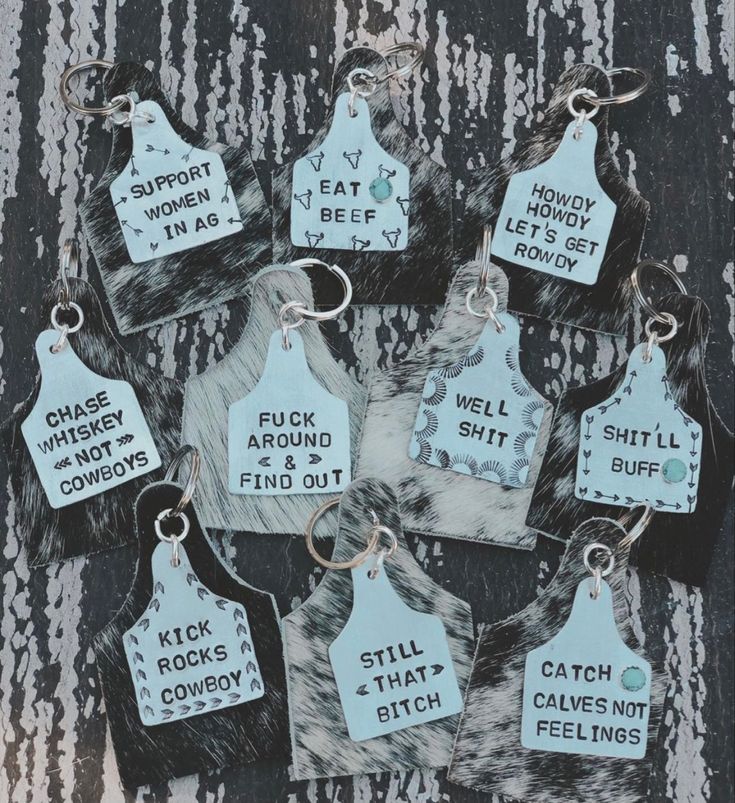 six key chains with tags that say, i'm not sure if they are real or fake