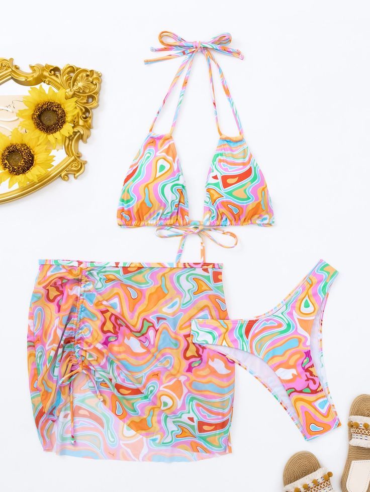 Embrace your inner mermaid with our Melusine bikini set. Featuring a playful swirl print and ruched tie detailing, this three piece set includes a halter strap for a secure fit. Made with comfortable polyester, you'll be ready to make a splash all summer long. Specs: Material: Polyester Halter Neck Swimwear With Drawstring For Beach Party, Halter Neck Beachwear Swimwear With Drawstring, Halter Neck Swimwear With Drawstring, Halter Neck Drawstring Swimwear For Pool, Halter Neck Swimwear With Drawstring For Pool, Multicolor Tie-side Halter Top For Beachwear, Drawstring Swimwear For Beach Season Party, Ruched Halter Top For Beachwear, Ruched Halter Top For Beach