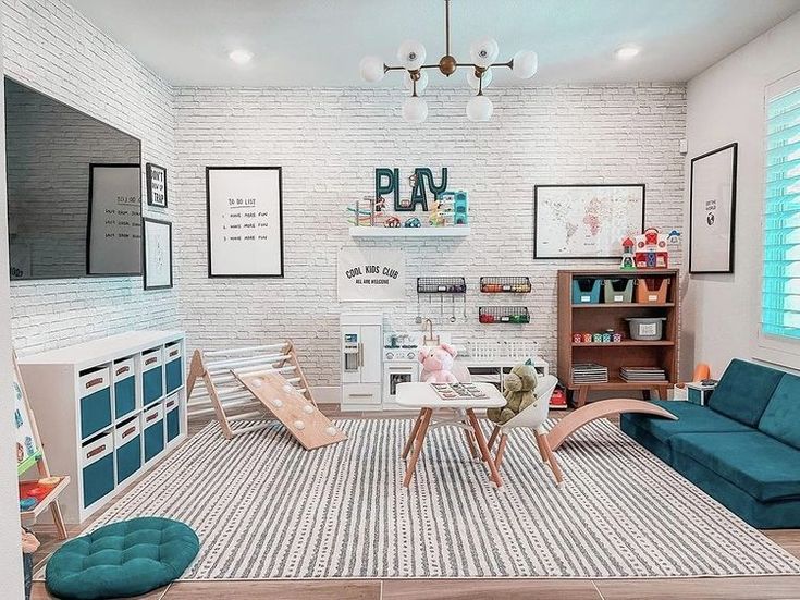 a living room filled with furniture and a flat screen tv mounted to the wall above it