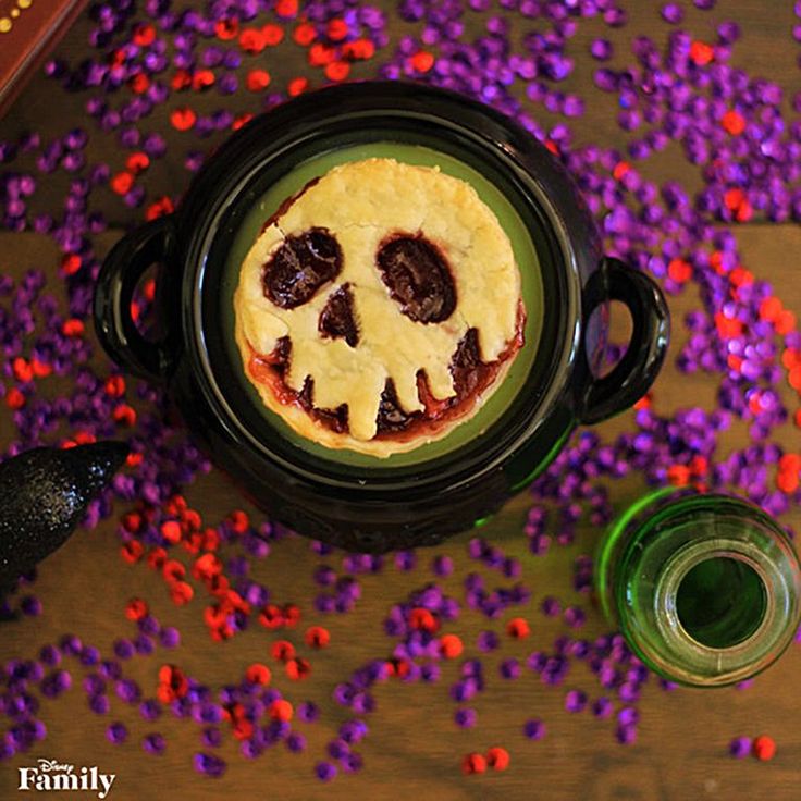 a halloween dessert with sprinkles on the table