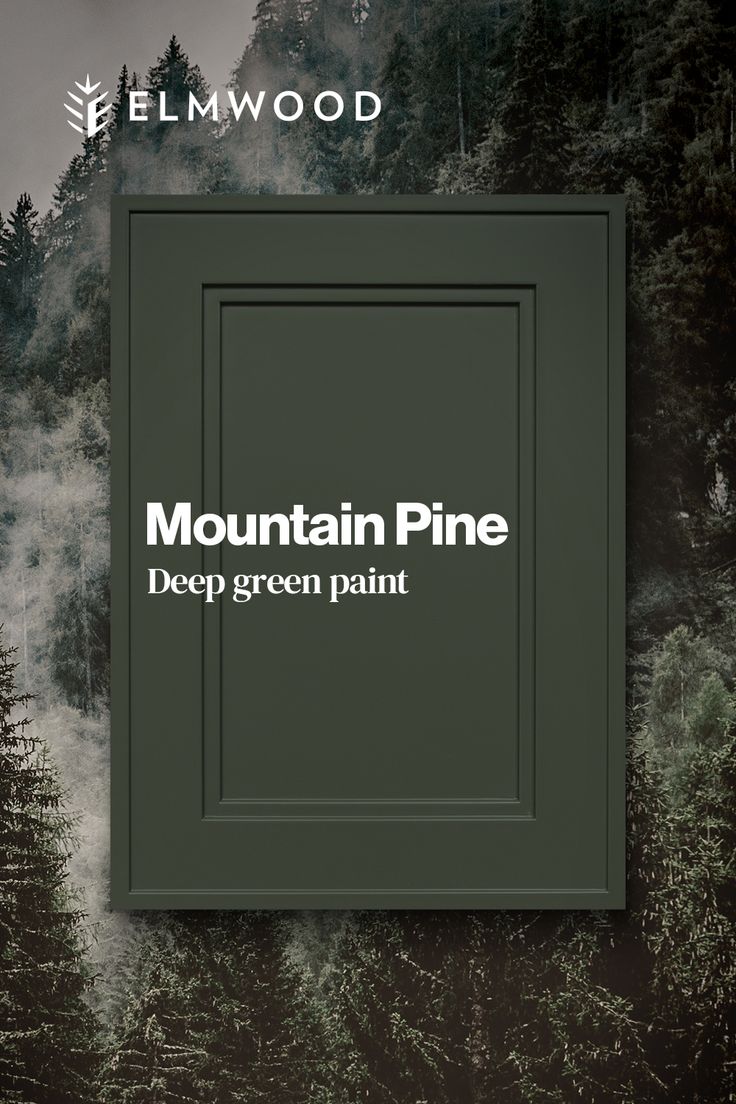 the mountain pine deep green paint is on display in front of a forest backdrop with trees