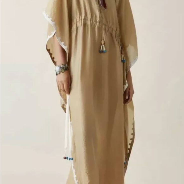 Zara Limited Edition Studio Embroidered Tunic Dress. I Bought It With Out Two Lateral Decorative Ball. See Picture Zara Kaftan For Spring Vacation, Zara Kaftan For Summer Vacation, Zara Short Sleeve Maxi Dress For Beach, Zara Kaftan For Vacation In Summer, Beige Maxi Dress With Tassels For Beach, Beige Tassel Maxi Dress For The Beach, Zara Bohemian Maxi Dress For Beach, Beige Tassel Maxi Dress For Beach, Traditional Beige Kaftan For Summer