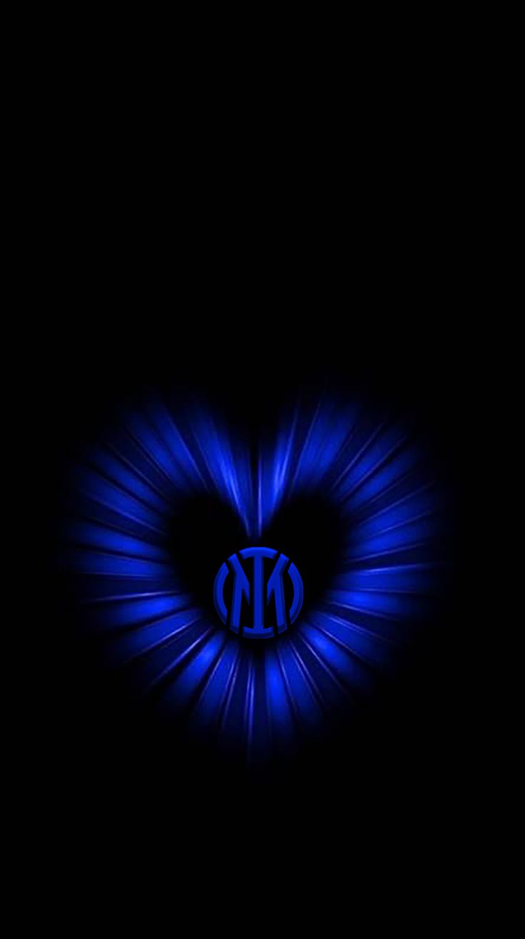 a dark background with blue lights and the letter n in it's center, forming a heart shape