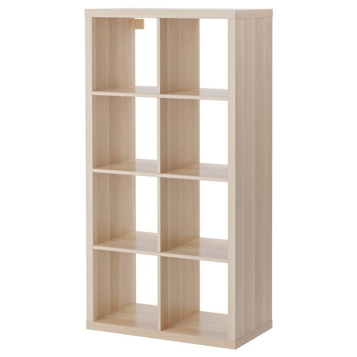 a wooden bookcase with four shelves on each side