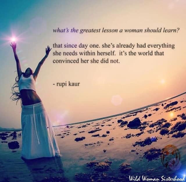 a woman standing on the beach with her arms up in the air and an inspirational quote