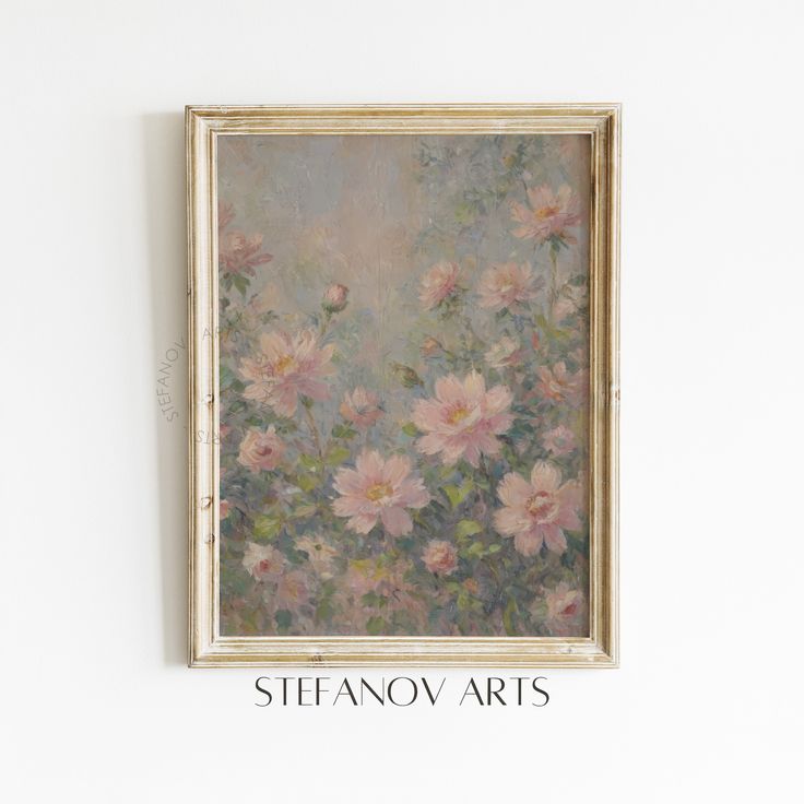 a painting hanging on the wall next to a vase with flowers in it's center