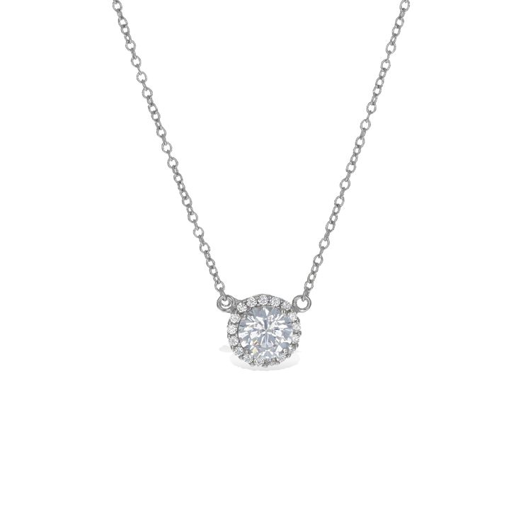 Meet your new favorite necklace that is perfect for both special events and everyday outfits. Alexandra’s Halo CZ Solitaire necklace is sure to become a sparkling wardrobe staple. Details: • Round Brilliant Cubic Zirconia Stones • 18k Yellow Gold Plated or Rhodium Plated Sterling Silver • Chain Length: Adjustable from 16 inches to 18 inches • Pendant Width: 10mm • Center Stone Size: 7mm Dazzling Formal Necklace With Brilliant Cut, Formal Dazzling Necklace With Brilliant Cut, Dazzling White Gold Necklace For Formal Events, Dazzling Brilliant-cut Necklace For Formal Occasions, Dazzling Formal Necklaces, Fine Jewelry Cubic Zirconia Charm Necklace With Adjustable Chain, Fine Jewelry Diamond Charm Necklace With Adjustable Chain, Formal Fine Jewelry Necklace With Prong Setting, Formal Fine Jewelry Necklaces With Prong Setting