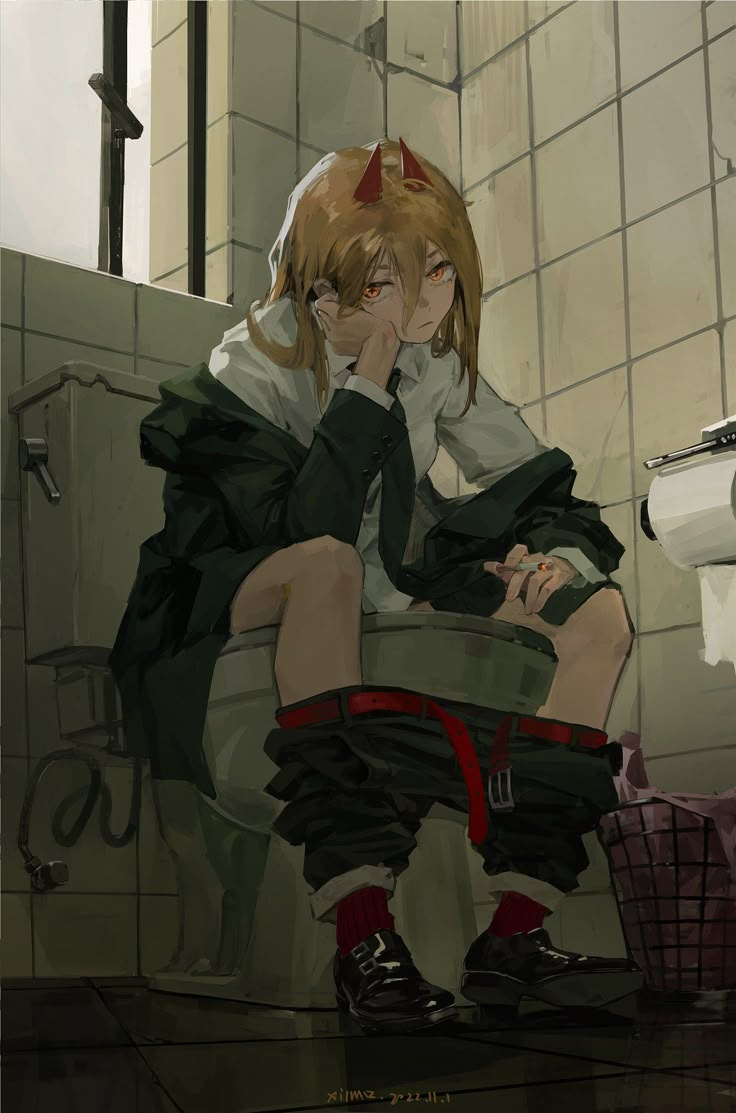 a person sitting on a toilet with their head in their hands and her eyes closed