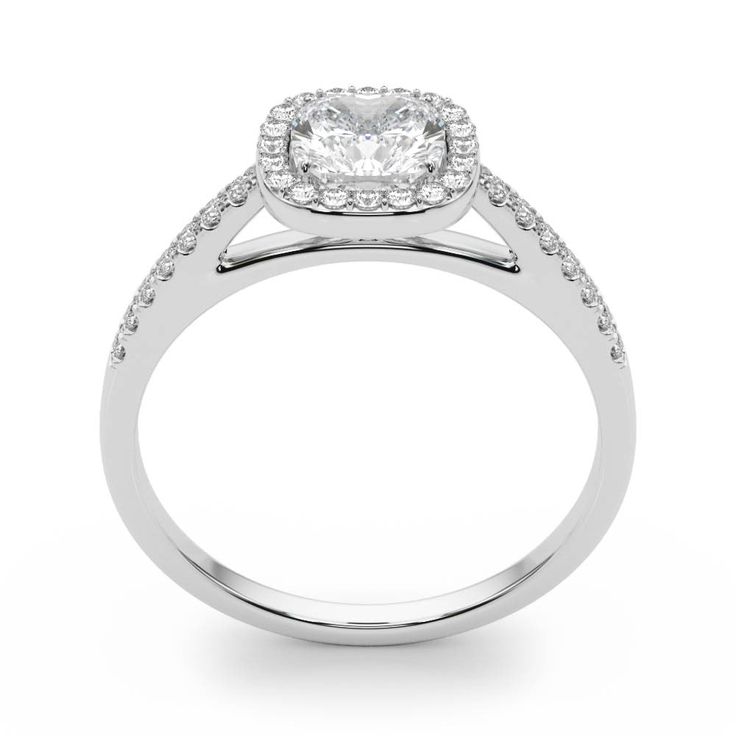 a white gold engagement ring with diamonds on the shoulders