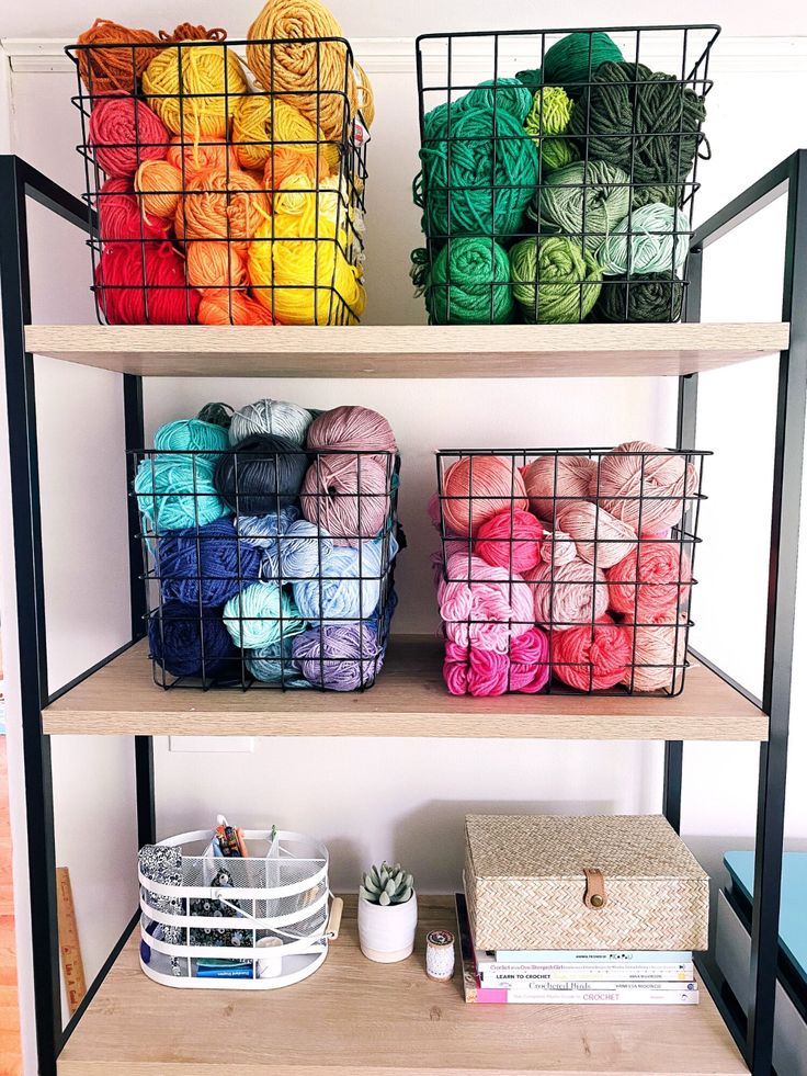 two shelves filled with yarn and crochet baskets