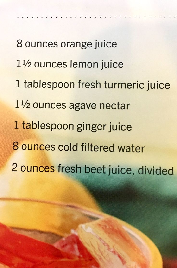 an orange juice is in a glass bowl with information about the ingredients and how to use it