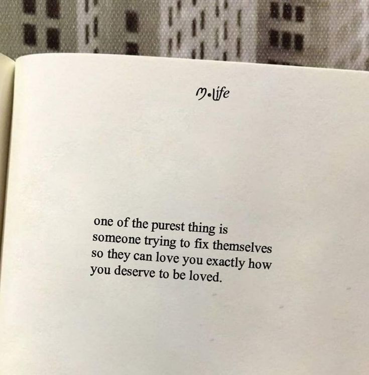 an open book with a poem written on it