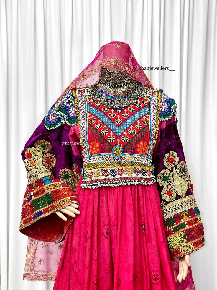 Beautiful afghan dress - traditional bridal afghan dress - Vintage Kuchi tribal Morden Dress - Afghan Dress For Women - Rare find as this is a vintage deess Measurements : UK SIZE 8 - 14 (SIZE MEDIUM ZIP) AND BELT TO ADJUST  Shoulder: 16inch Waist: 20 inch  Body: 15inch Arm length: 23 Material : printed pink Afghan Vintage meterial , and silk material is used for the shalwar, highest quality. - Expect imperfections as this is a vintage item, it has been made with care Hand stitched and perfectly Fitted Bohemian Dabka Choli, Bohemian Style Ceremonial Dupatta With Dabka, Bohemian Dabka Work Dupatta For Ceremonial Use, Bohemian Ceremonial Dupatta With Dabka Work, Bohemian Dupatta With Dabka Work For Ceremonial Use, Bohemian Choli For Eid, Bohemian Long Sleeve Dress With Motifs, Bohemian Wedding Dress With Motifs, Bohemian Choli With Dabka Work For Traditional Ceremonies