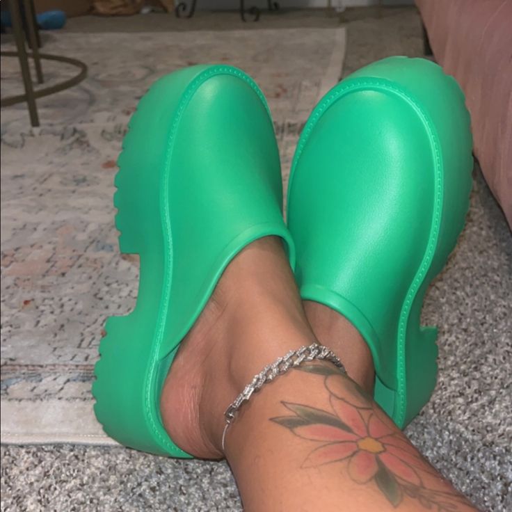 Green Rubber Platform Clogs. Runs Small Size Up Casual Synthetic Platform Slippers With Chunky Platform, Casual Platform Clogs With Flat Heel, Casual Flat Heel Platform Clogs, Casual Platform Clogs, Trendy Flat Platform Clogs, Trendy Synthetic Clogs With Chunky Platform, Trendy Platform Clogs With Synthetic Material, Trendy Synthetic Platform Clogs, Trendy Synthetic Clogs For Spring