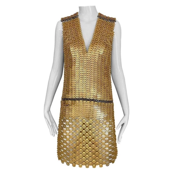 Paco Rabanne Gold Chain Cocktail Dress | From a unique collection of rare vintage Cocktail Dresses at https://www.1stdibs.com/fashion/clothing/evening-dresses/cocktail-dresses/. Luxury Sleeveless Summer Evening Dress, Luxury Sleeveless Mini Dress For Party, Gold Sleeveless Mini Dress For Cocktail Events, Gold Sleeveless Mini Dress For Formal Occasions, Luxury Gold Sleeveless Dress, Fitted Chainmail Dress For Evening, Elegant Chainmail Dress For Night Out, Glamorous Evening Dresses With Chainmail, Fitted Chainmail Dresses For Evening