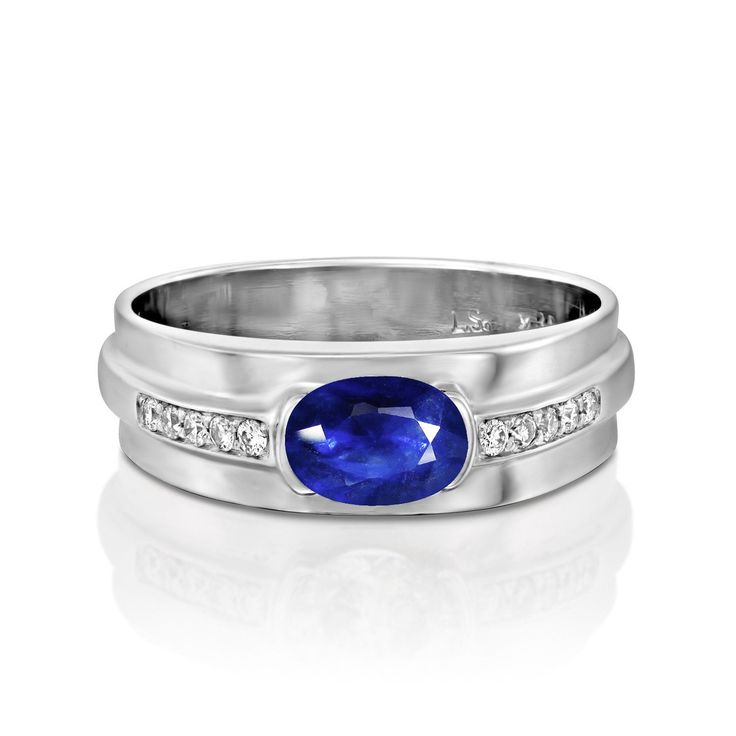 "Classic blue promise ring, simple and elegant. With real natural Blue Ceylon Sapphire, beautiful gemstone in the center. Set with white diamonds on each side. Made of 14k solid white gold. This fine designed ring could be classic for engagement,wedding or anniversry. Gmological Certificate The ring comes with a certificate of authenticity from international gemological institution: IGL SETTING Metal : 14k solid white gold. Ring Size: Size Selectable (4-9 US sizes) Width: 5 mm MAIN STONE 1 carat Classic Blue Sapphire Ring In 14k White Gold, Blue Promise Rings With Diamond Accents, Classic Blue Rings With Lab-created Sapphire, Classic Blue Lab-created Sapphire Rings, Classic Blue Diamond Ring With Accents, Classic Blue Sapphire Ring With Diamond Accents, Formal Rings With Diamond Cut Lab-created Sapphire, Classic Blue Diamond Birthstone Ring, Blue Polished Promise Rings