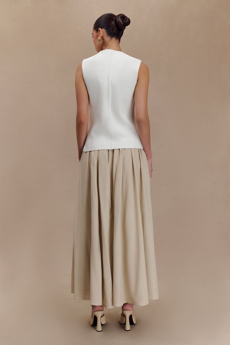 In flow.The CLARENCE is a an update on the iconic A-line linen maxi skirt. A true statement piece destined to be a core piece of your wardrobe, it features a high-waisted silhouette that cinches at the waist, complete with a waistband for added structure and definition. The A-line full skirt cascades gracefully to the floor, creating a sense of movement and fluidity with every step. Lined for comfort and opacity, we've crafted it with a concealed back zipper for a seamless finish. Linen Maxi Skirt, In Flow, Jasmine Tookes, Ceremony Dresses, Linen Suit, Black Tie Wedding, Crepe Dress, White Maxi Dresses, Linen Dresses