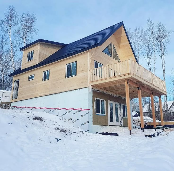 a large house is built in the snow