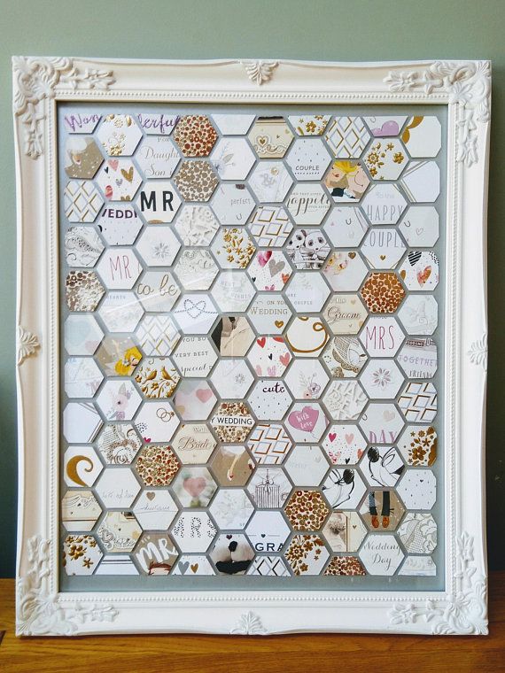 a white frame with lots of magnets on it