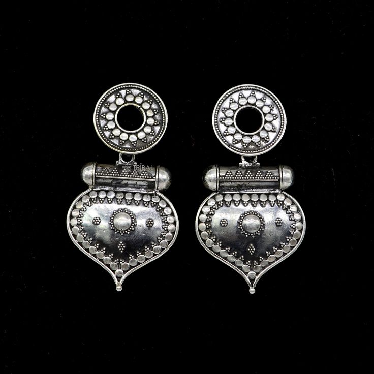 925 sterling silver handmade gorgeous stud earrings drop dangle vintage antique design earrings belly dance tribal jewelry from Rajasthan India. Metal-925 sterling silver. Type-drop dangler earrings. Length-6.2 centimetre approx. Width-3.2 centimetres approx. Weight-28.060 grams. Marking-925 closure-push back. Makes excellent gifting and collectible pieces. Silver Metal Bridal Earrings For Festivals, Ornate Silver Bridal Earrings For Festive Occasions, Elegant Silver Plug Earrings With Oxidized Finish, Ornate Silver Earrings For Festive Occasions, Festive Silver Drop Earrings, Festive Silver Metal Earrings, Festive Silver Ornate Earrings, Silver Metal Bridal Earrings For Festive Occasions, Ornate 925 Stamped Silver Dangle Earrings