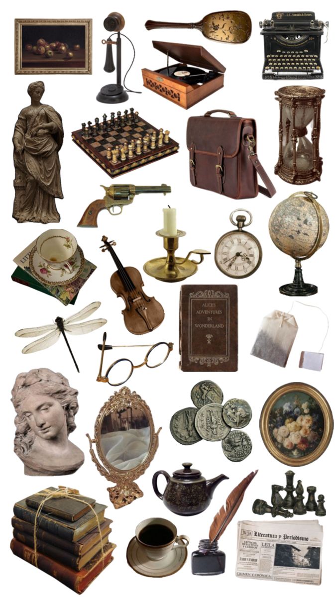 an assortment of antique items including books, keys, glasses and other things on display