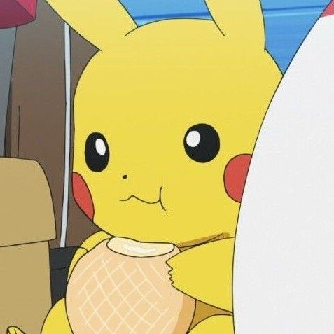 a pikachu sitting in the back seat of a car holding a cup and looking at something