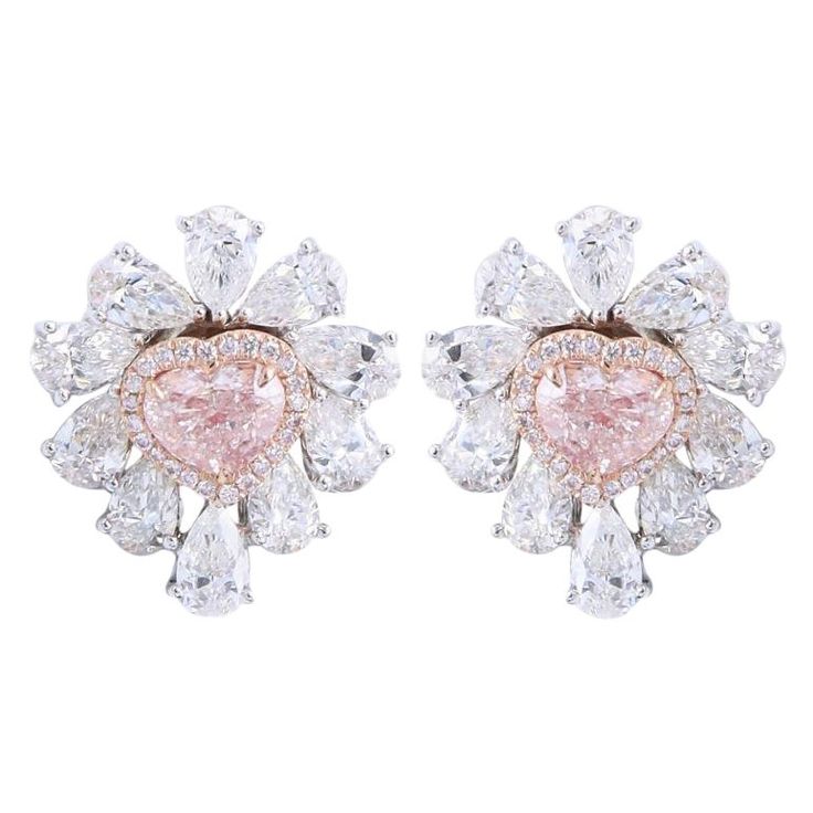 From the Museum Vault at Emilio Jewelry located on New York's iconic Fifth avenue, The focal point of these magnificent earrings feature 2 heart shape natural Fancy light Pink diamonds totaling 3.00 carats. Please inquire for details. An additional 7.27 carats of colorless diamonds creating this striking earrings into an everyday earring , which can also be worn as just plain pink diamond studs since the earring is also a jacket. Please inquire for additional details. All pieces are hand made in Emilio Jewelry, Harry Winston Ring, Jewelry Atelier, Pink Diamond Earrings, Yellow Diamond Earring, Pink Stud Earrings, Fancy Light, Vintage Stud Earrings, Pink Diamonds