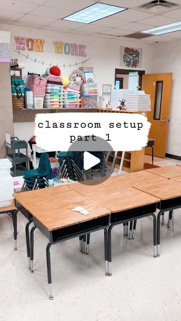 an empty classroom with desks and chairs in front of the teacher's desk