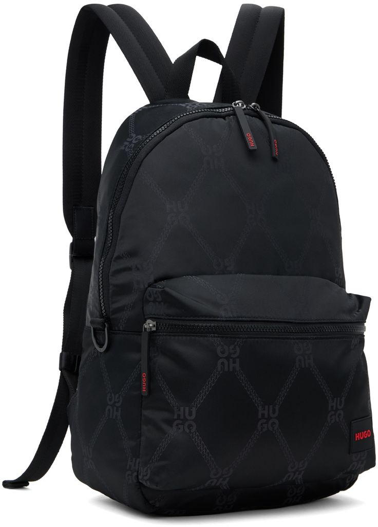 Satin backpack in black. · Jacquard logo pattern throughout · Webbing carry handle · Padded adjustable mesh shoulder straps · Rubberized logo patch at front · Zip pocket · D-ring at sides · Two-way zip closure · Zip pocket at interior · Laptop compartment · Full logo-woven satin lining · H16.5 x W11.5 x D6.5 Supplier color: Black Black Travel Bags With Logo Hardware, Travel Backpack With Logo Hardware, Black Travel Backpack With Logo Hardware, Nylon Logo Bags For Daily Use, Nylon Bags With Logo For Daily Use, Functional Nylon Backpack With Logo, Functional Backpack With Logo For Everyday Use, Travel Nylon Bag With Logo, Nylon Logo Backpack