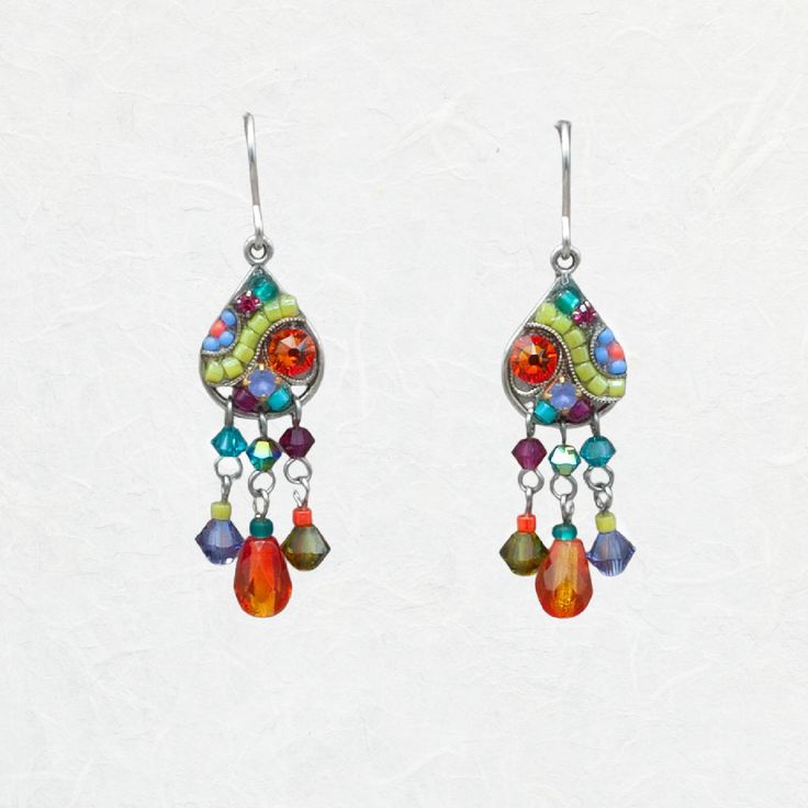 a pair of colorful earrings hanging from hooks