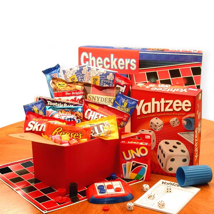 an assortment of games and snacks on a table