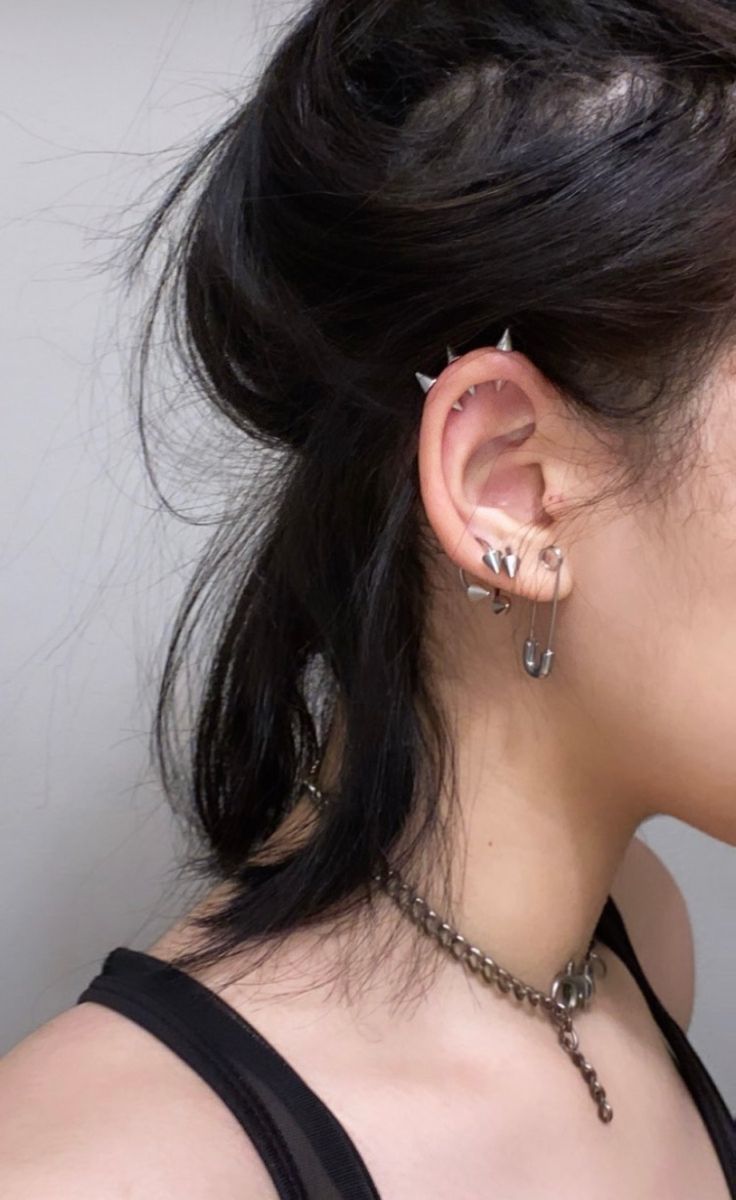 a woman with ear piercings on her ears