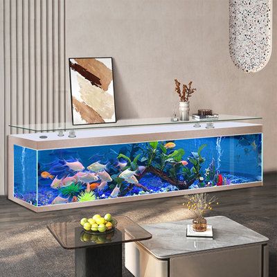 a fish tank in the middle of a living room