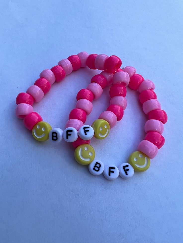 Interested in these BFF preppy beaded bracelet?  2 for 1 pricing- limited time.  These items would look great on your wrist and your best friend's.  All beads and color options can be modified.   Please message me for customization. Thanks for visiting my shop and thanks for your support. Customizable Pink Fun Bracelets, Pink Beaded Jewelry For Best Friend Gift, Trendy Customizable Friendship Bracelets With Round Beads, Trendy Beaded Bracelets For Best Friend Gift, Casual Pink Beaded Bracelets For Best Friend, Pink Beaded Bracelet For Best Friend Gift, Pink Novelty Beaded Bracelets With Letter Beads, Novelty Pink Friendship Bracelets With Round Beads, Pink Novelty Beaded Bracelet With Letter Beads