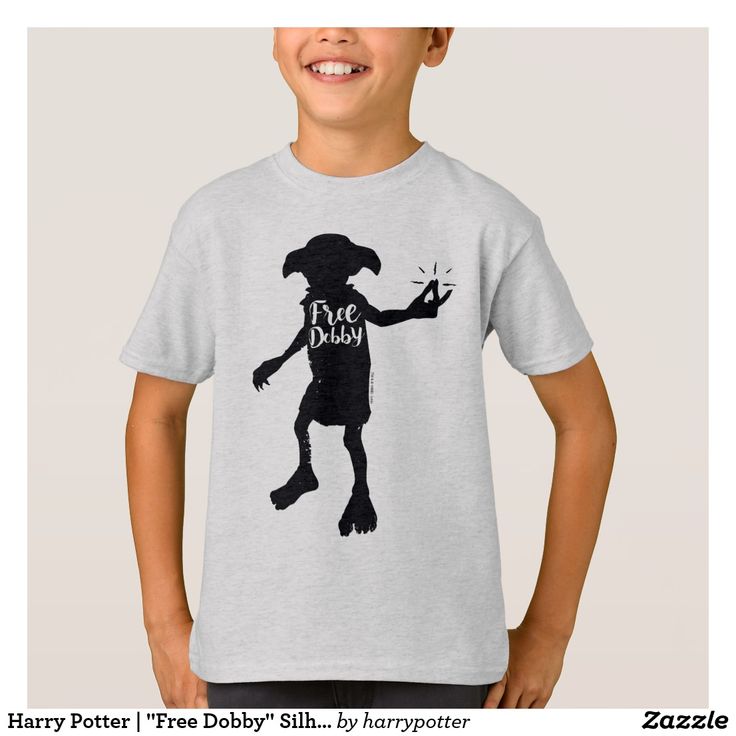 a young boy wearing a t - shirt with the silhouette of a dog