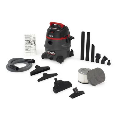 a vacuum is shown with its accessories and cleaning supplies