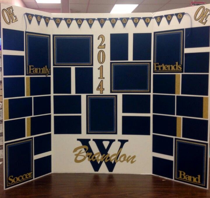 a blue and white photo booth with gold lettering