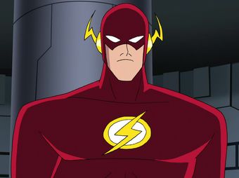 the flash standing in front of a building with his hands on his hips and eyes closed