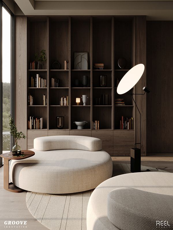 a living room filled with furniture next to a large glass window and bookshelf