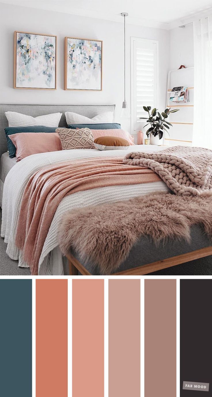 a bedroom with pink and grey colors in the walls, bedding and rugs