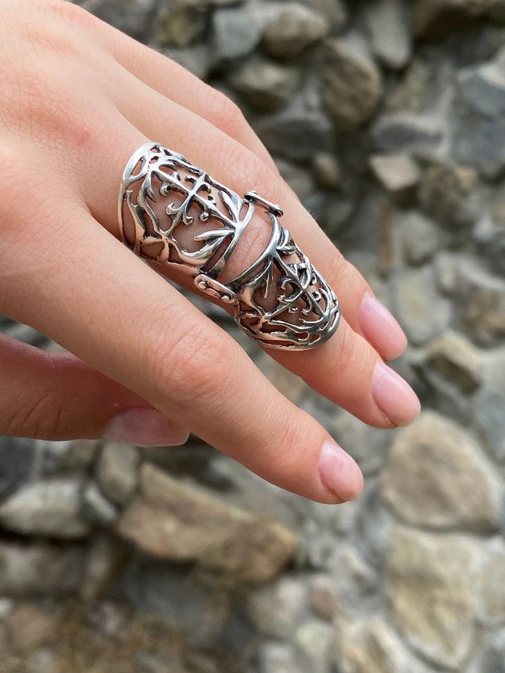 It is designed so as not to interfere with the finger movements, and you will want to wear it all day long. Armor full finger Ring shield ring sterling silver armor ring Knuckle joint ring Vintage armor ring Full finger long ring Armenian silver Worldwide tracked shipping 3-5 weeks NOTE. Please choose your exact size , as the band is wide we make it a bit larger For more Double rings chech here https://www.etsy.com/listing/862258018/double-ring-chain-ring-double-chain-ring?ref=shop_home_active_1 Whole Finger Ring, Big Finger Rings, Finger Rings Silver, Chunky Rings Silver, Armor Rings, Armor Jewelry, Finger Armor, Long Rings, Silver Armor