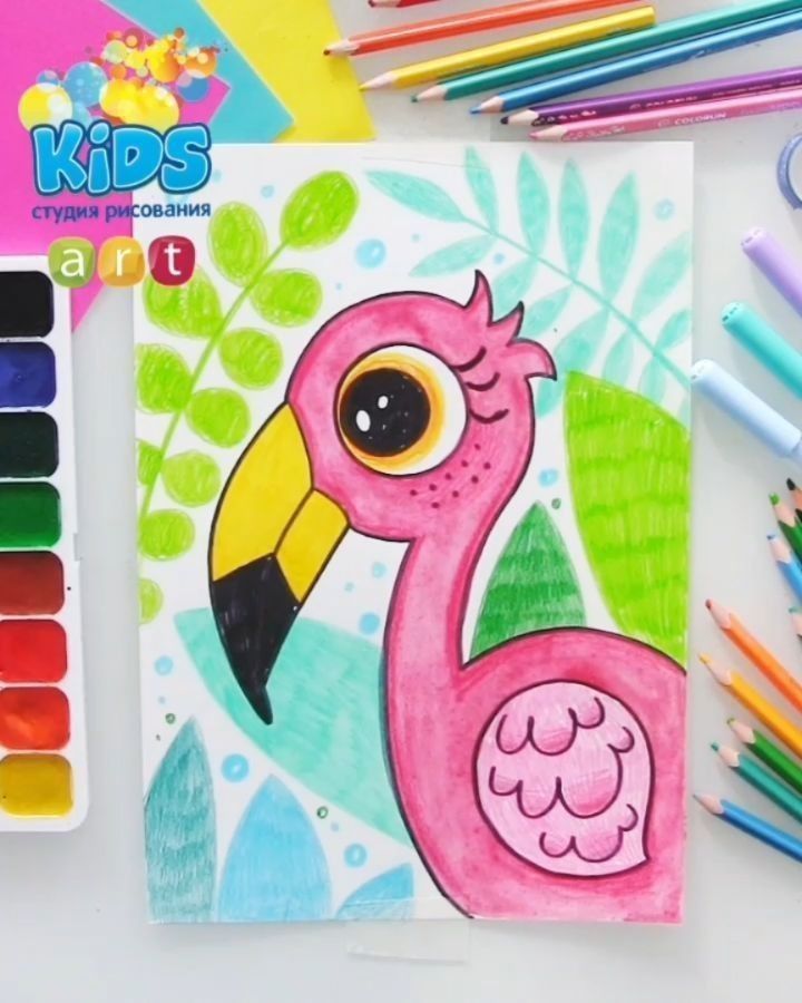 a drawing of a flamingo with colored pencils next to it